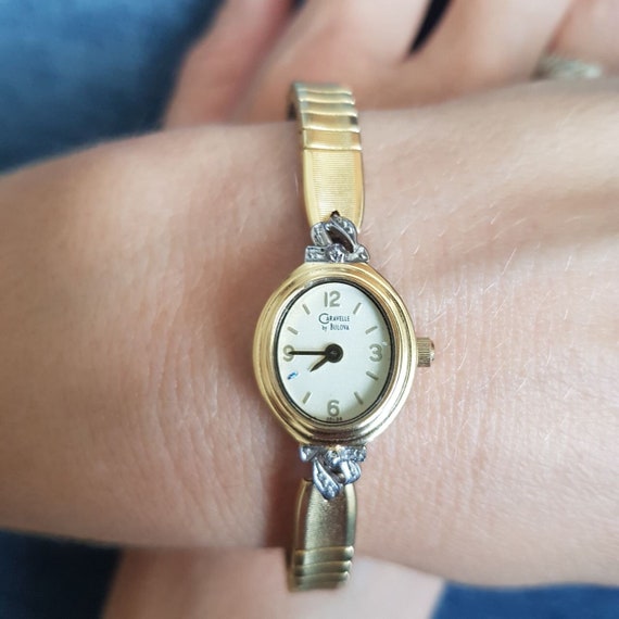Bulova quartz t8 shop base metal bezel
