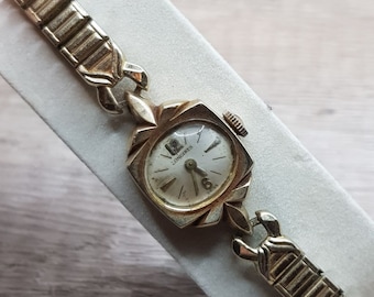 Longines schweiziskt damarmbandsur med 17 juveler, 10 karat guldfyllt, 1965