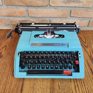 Kmart 300 Deluxe 12 Turquoise Vintage Typewriter with Case
