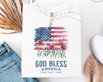 Camiseta con bandera estadounidense floral, camiseta con colores cómodos "Dios bendiga a Estados Unidos"