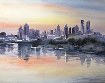 May include: A watercolor painting of a city skyline at sunset. The city is silhouetted against a pale orange and pink sky, with a river reflecting the colors of the sky.