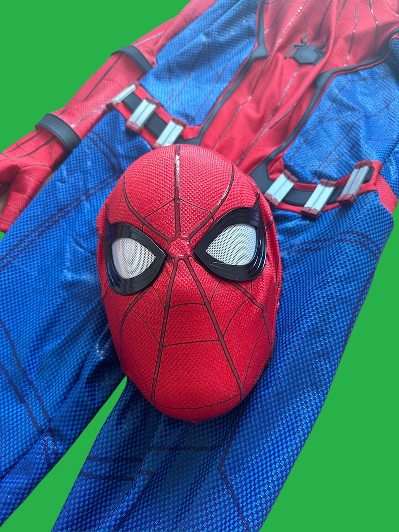 May include: Red and blue Spider-Man costume with a red mask featuring a spider web design and white eyes.