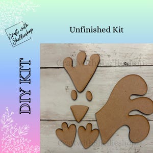 May include: Unfinished DIY kit with wooden pieces to create a rooster. The kit includes a head, body, feet, and beak. The text "Unfinished Kit" is displayed in black, and the text "DIY KIT" is displayed vertically.