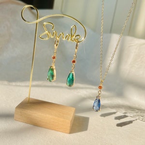 a set of crystal howl made necklace howl earrings，Environmentally friendly
