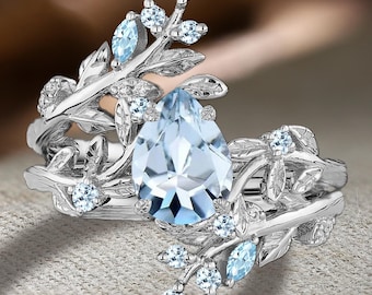 ペアカットのアクアマリンリング、ヴィンテージリーフのつる
