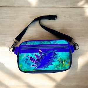 May include: A trio of ceramic mugs with a speckled, matte finish in cream, light grey, and dark grey. The mugs have a simple, minimalist design, suitable for coffee or tea.