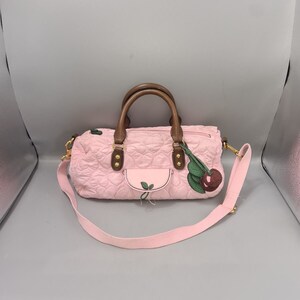 Baby phat deals handbags wholesale