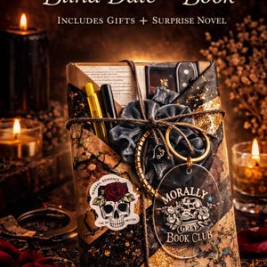 May include: A book wrapped in black and gold paper with the text Spicy Dark Romance Blind Date with a Book, Includes Gifts + Surprise Novel. It features a skull sticker, a grey scrunchie, pens, and a clear tag reading Morally Grey Book Club.