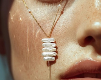 Collar de oro con lazo de perlas Biwa