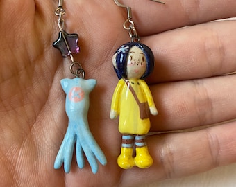 Handmade Ceramic Coraline Figurine Earrings, Yellow Coat, Star Charm
