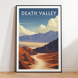 May include: A vintage-style poster with a scenic view of Death Valley National Park in California. The poster features a blue sky with white clouds, a winding road leading into a canyon, and mountains in the distance. The text "DEATH VALLEY NATIONAL PARK - NEVADA - ESTABLISHED 1934" is printed at the top of the poster.