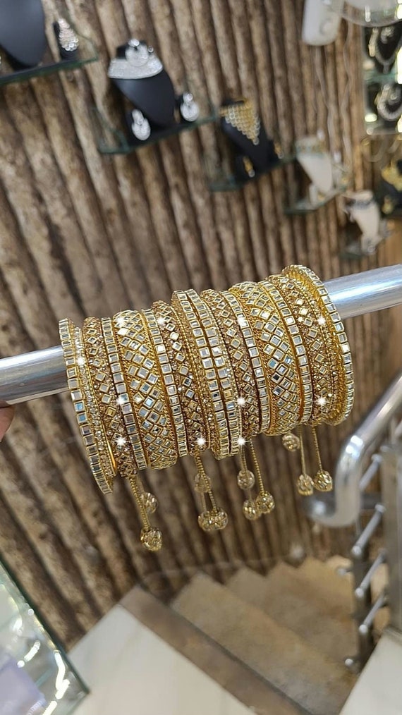 Golden artificial bangles discount
