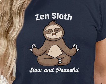 May include: A navy blue t-shirt with a cartoon sloth meditating. The text "Zen Sloth" is above the sloth and "Slow and Peaceful" is below the sloth.