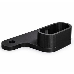 May include: A black, 3D-printed object with an oval-shaped cup and a flat base with a circular hole. The object is designed with a modern, minimalist aesthetic.