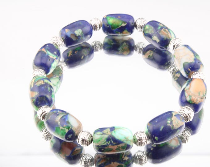 Featured listing image: Blue Emperor Pine Barrel beaded Bracelet with silver colour spacers Hand made Stretchy