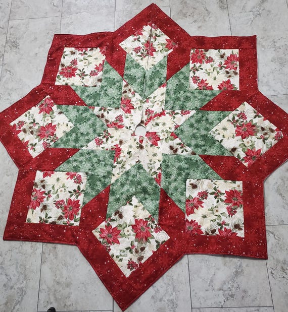 Large poinsettia and silver snowflakes quilted Christmas tree skirt