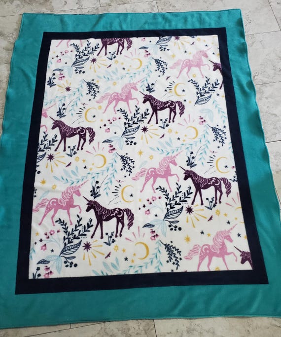 Majestic unicorns and flowers double layered reversible fleece throw blanket