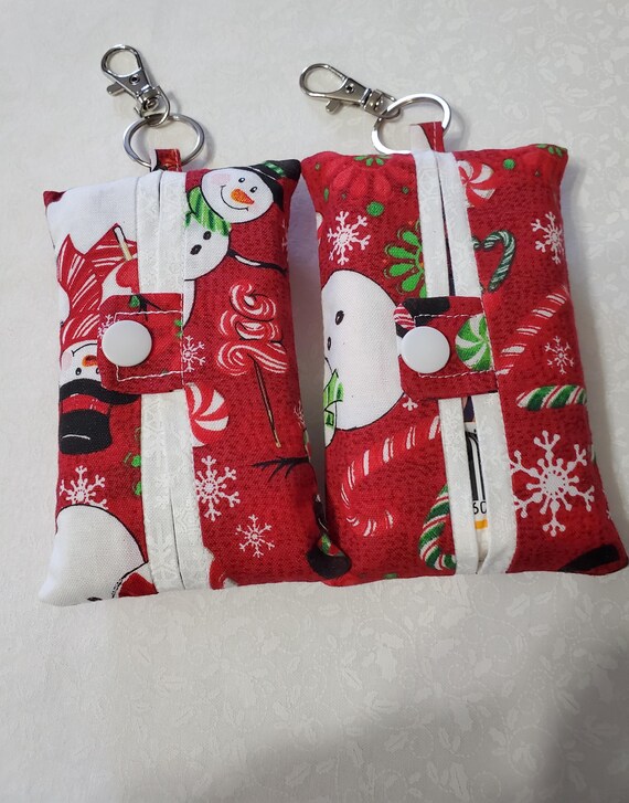 Randomly picked set of three cute little traveling tissue holders with tissue and clasp included to hook to keys bag or in the car