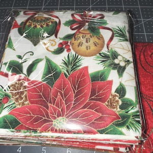 50 pieces of 5 inch square prewashed Christmas cotton fabric variety pack
