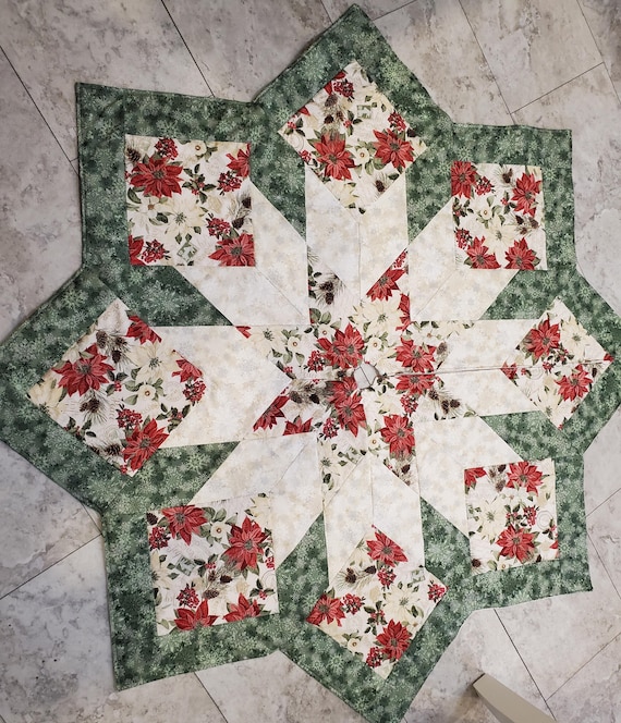 Large beautiful poinsettia, pinecones and silver snowflakes quilted Christmas tree skirt
