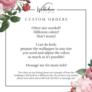 a white card with pink roses on it