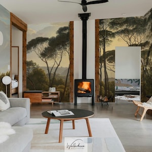 May include: A living room featuring a landscape mural, a black fireplace with a burning fire, and a round coffee table. The room includes a grey sofa, a white rug, and wooden accents. A ceiling fan is visible.