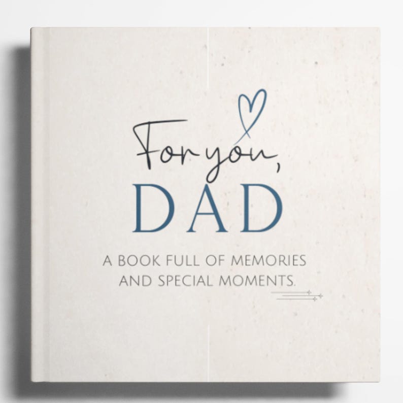 May include: A square, off-white book with the words "For you, DAD" in black and navy blue script. A navy blue heart is above the word "DAD". The text "A book full of memories and special moments" is below.