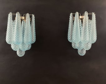 Pair of vintage blue glass petals drop wall sconce.