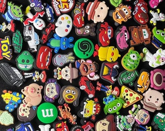 Toy story shoe and crocs charms/cars/animals/pizza/chicky/letters, Alien and different vareity of charms in amazing characters