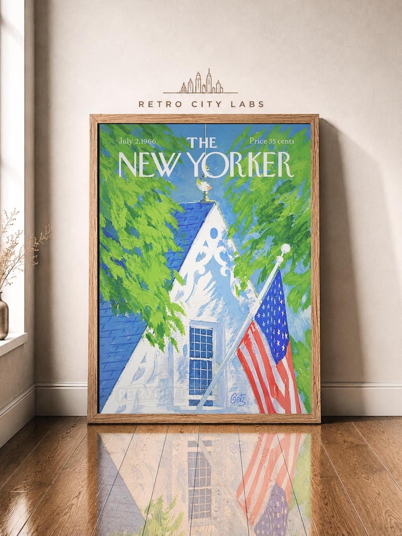 May include: A framed print of a July 2, 1966 New Yorker magazine cover featuring a painting of a white house with a blue roof, green trees, and an American flag on a pole. The text reads The New Yorker, July 2, 1966, and Price 35 cents.