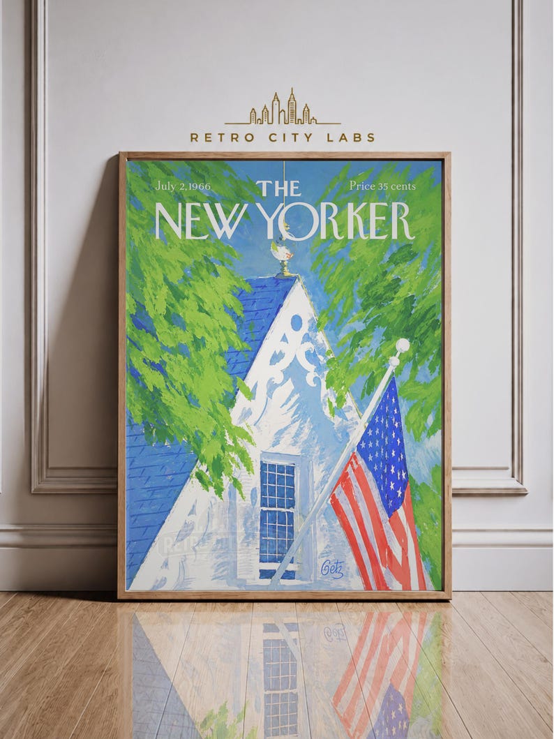 May include: A framed print of a July 2, 1966, The New Yorker magazine cover featuring a white house with a blue roof, green trees, and an American flag. The text reads July 2, 1966, The New Yorker, and Price 35 cents, with the artist signature Getz.