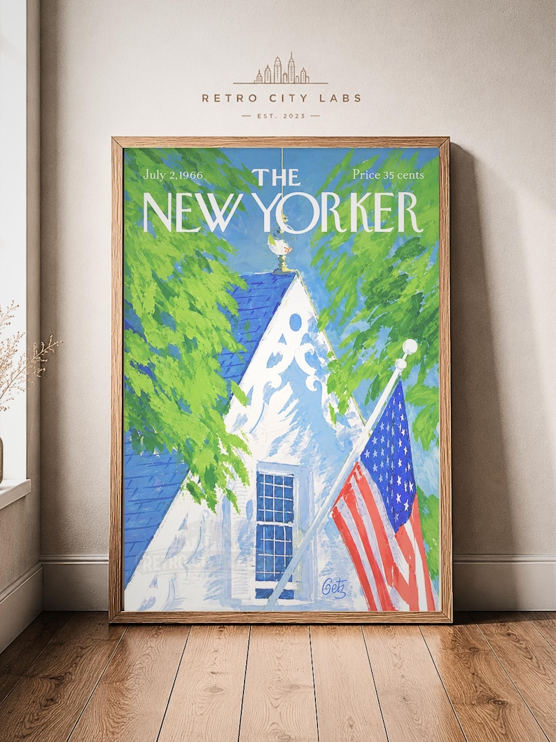 May include: A framed print of The New Yorker magazine cover dated July 2, 1966, featuring a painting of a white house with a blue roof, green trees, and an American flag. The text reads July 2, 1966, The New Yorker, and Price 35 cents.