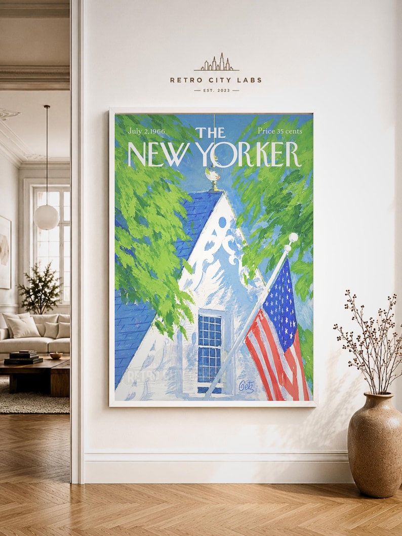May include: A framed print of The New Yorker magazine cover dated July 2, 1966. The artwork features a white house with a blue roof, green trees, and an American flag. The text reads The New Yorker, July 2, 1966, and Price 35 cents.