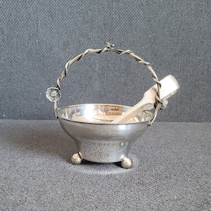 Vintage silver-plated sugar bowl and sugar tongs