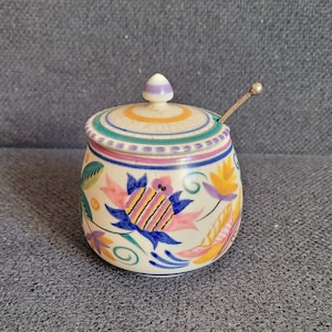 Vintage pot for jam or honey Poole Pottery Fuschia with a silver-plated spoon.