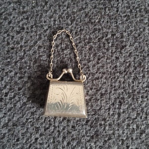 A miniature Vintage pendant-medallion-pill box, made of pure 925 sterling silver
