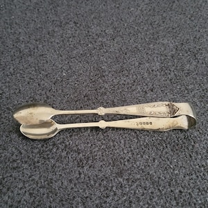 Antique silver-plated sugar tongs