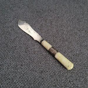Antique silver-plated butter knife