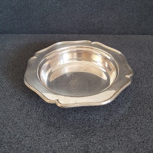 Antique silver-plated plate. Made in Dublin by jewelry firm Weir & Sons.