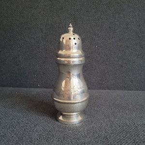 Silver-plated salt shaker with handmade engraving