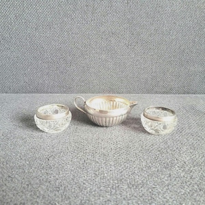 Antique Mappin & Webb sterling silver creamer and two salt bowls