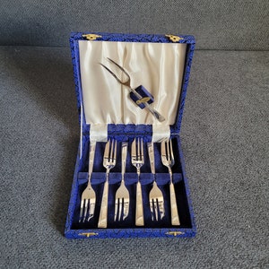 Vintage English set of silver-plated dessert forks