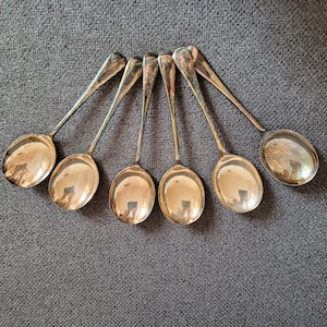 A set of English silver-plated soup spoons