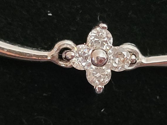 Three vintage jewelry pieces with refined sparkle. View 6