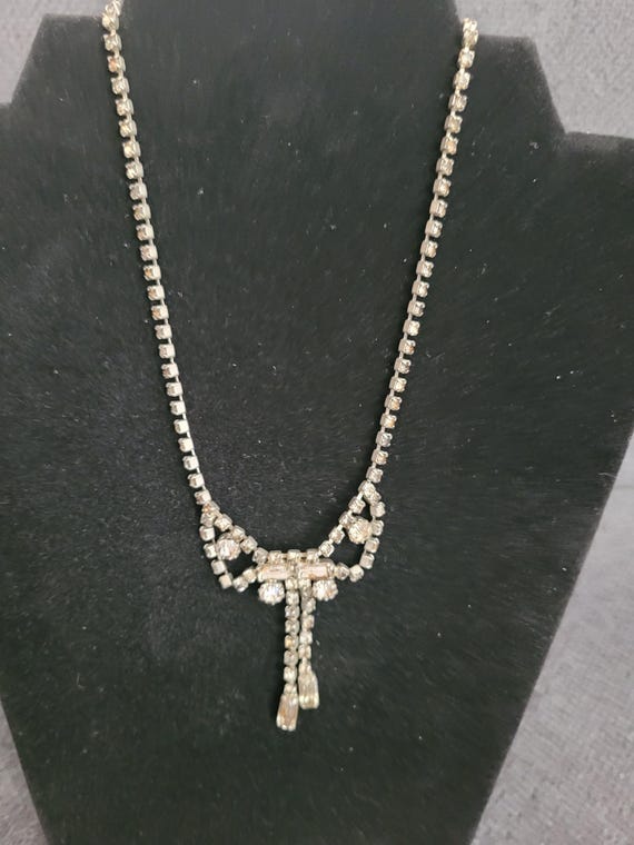 Three vintage jewelry pieces with refined sparkle. View 3