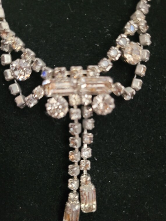 Three vintage jewelry pieces with refined sparkle. View 4
