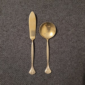 Vintage gold-plated spoon and fish knife.