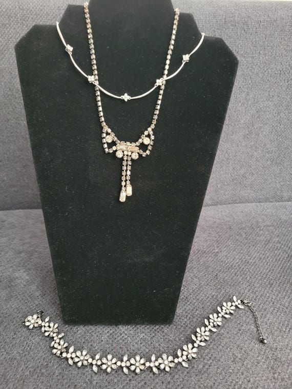 Three vintage jewelry pieces with refined sparkle. View 2