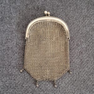 Antique silver chainmail purse.