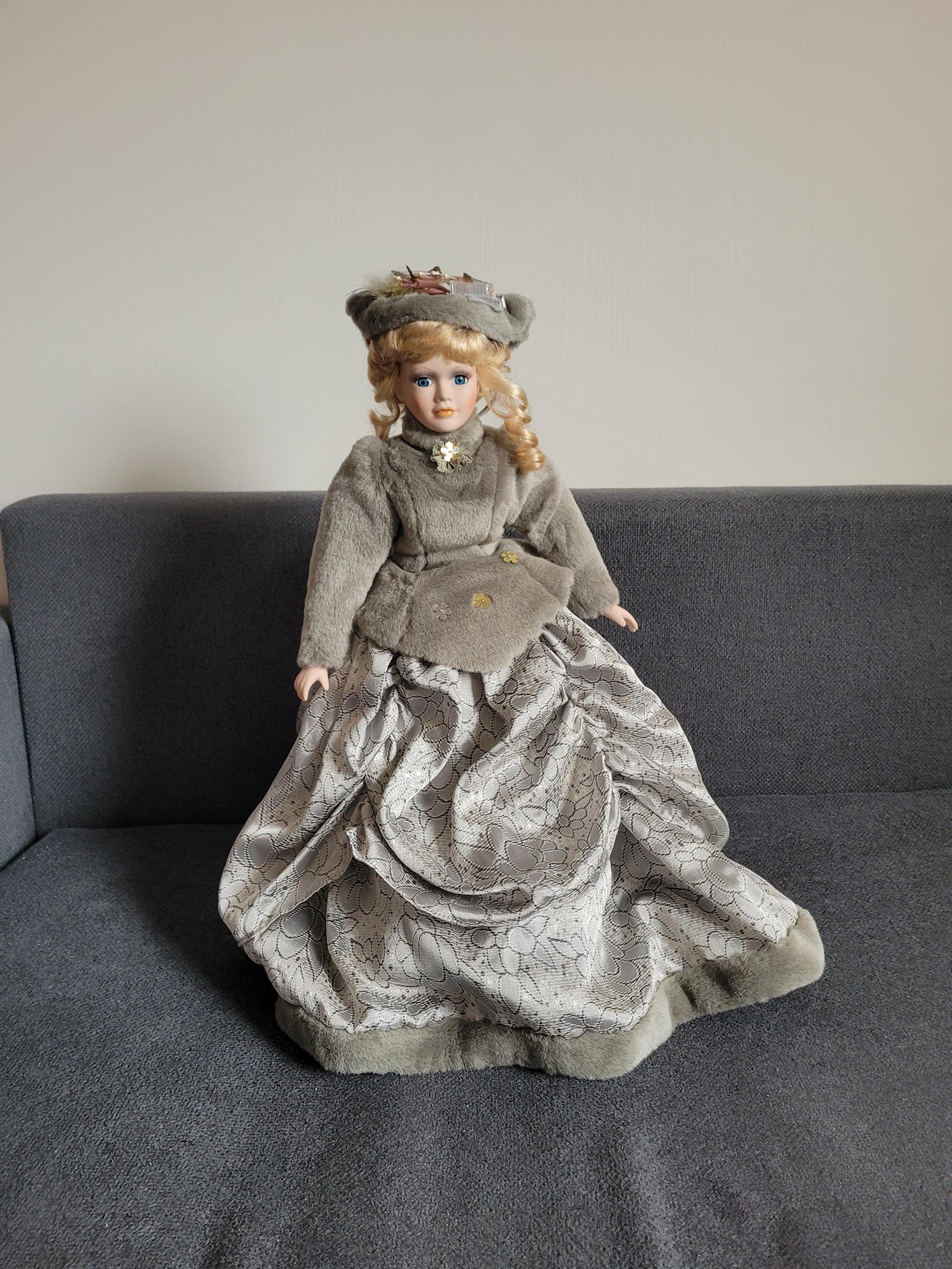 Vintage new large collectible porcelain doll.